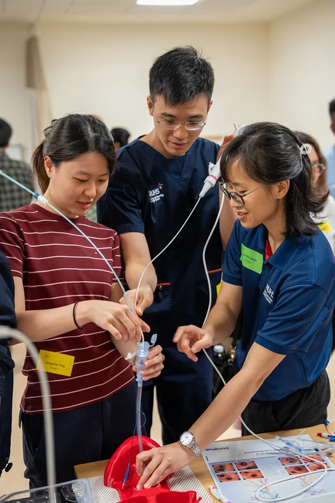 Participants threading an airway exchange catheter