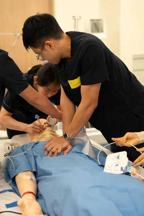 Chest compressions during the airway simulation scenario